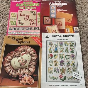 Needlepoint/cross stitch pattern books